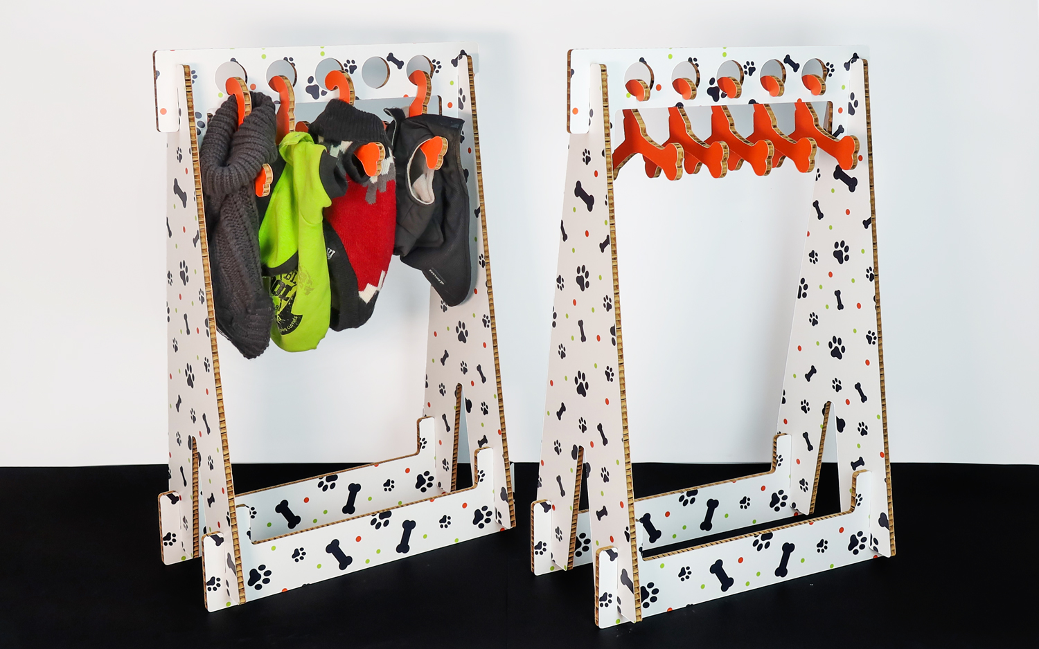 Expositor de ropa personalizado para tiendas de animales.