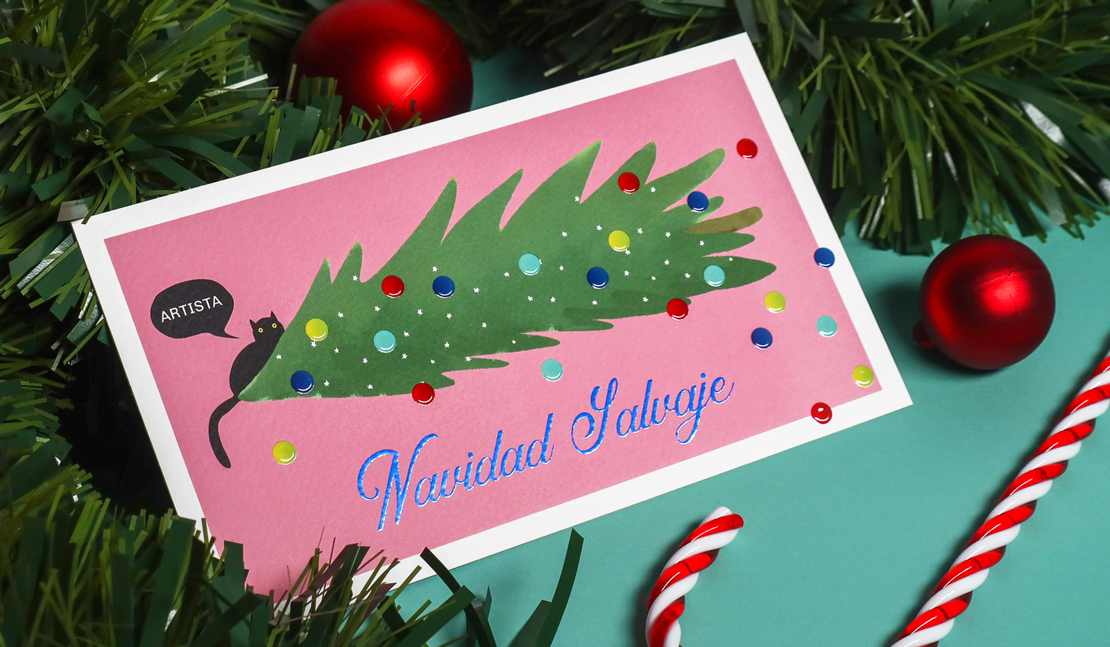 Tarjetas navideñas divertidas con ilustración de gato y acabado Cristal sobre papel Tintoretto Touch Class.