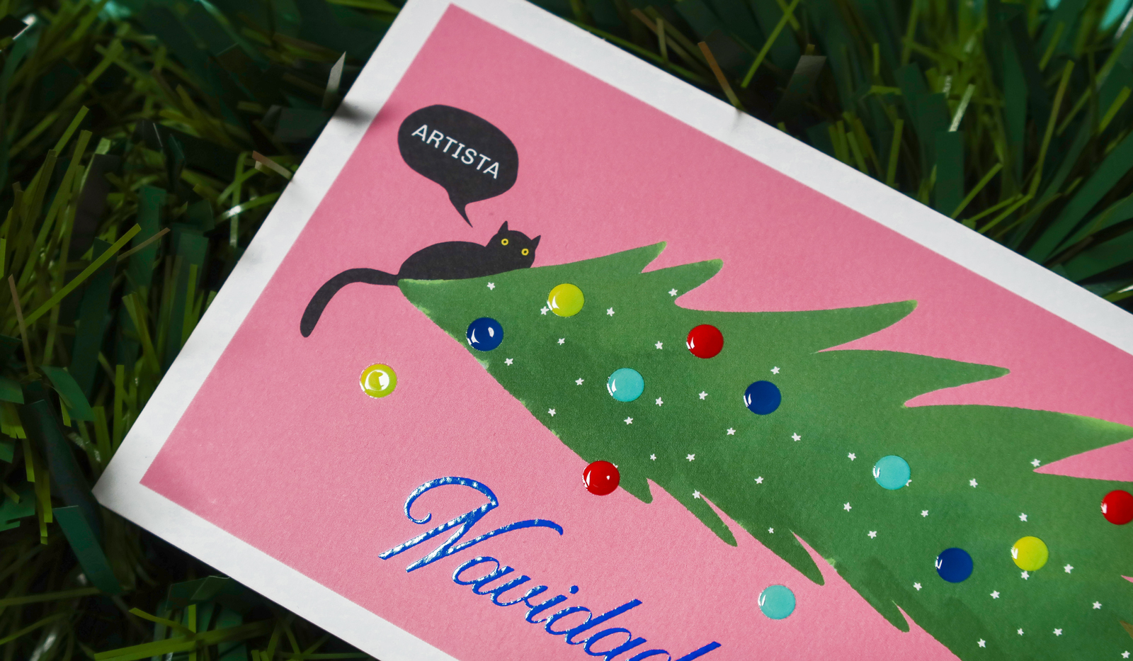 Tarjetas navideñas divertidas con ilustración de gato y acabado Cristal sobre papel Tintoretto Touch Class.